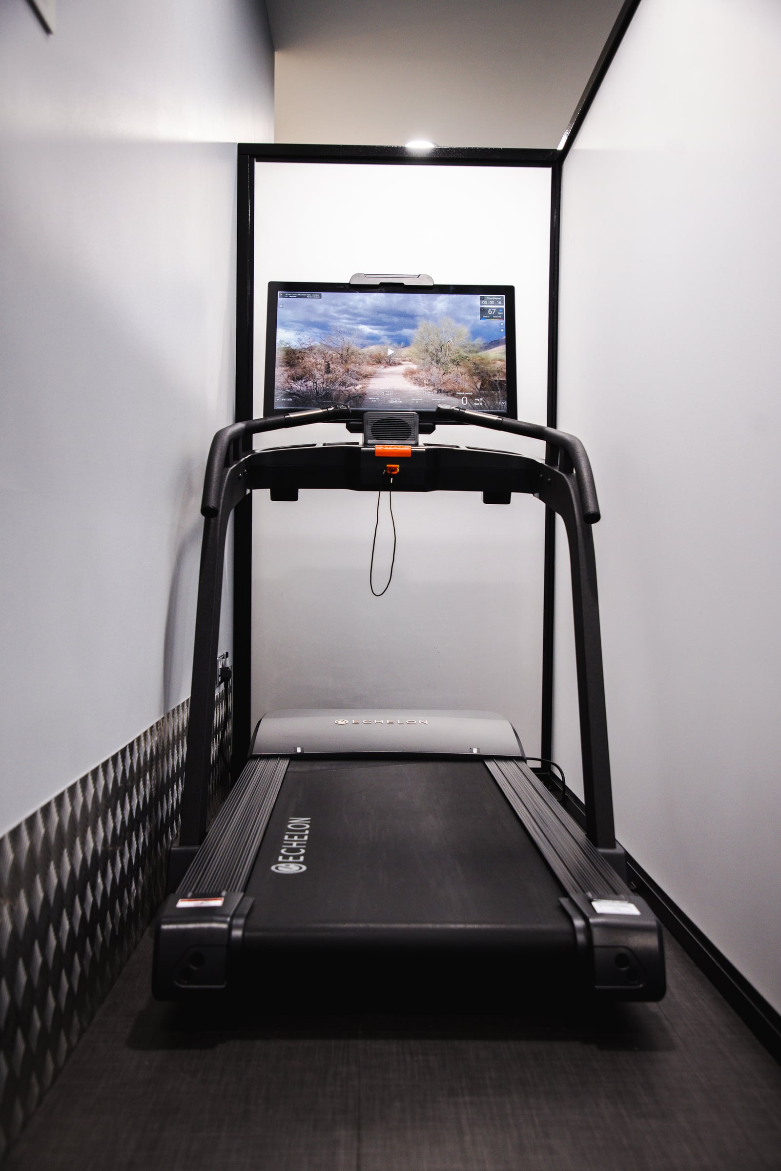 Echelon Stride S treadmill in a visually private cardio zone at GYMPODS Dalston