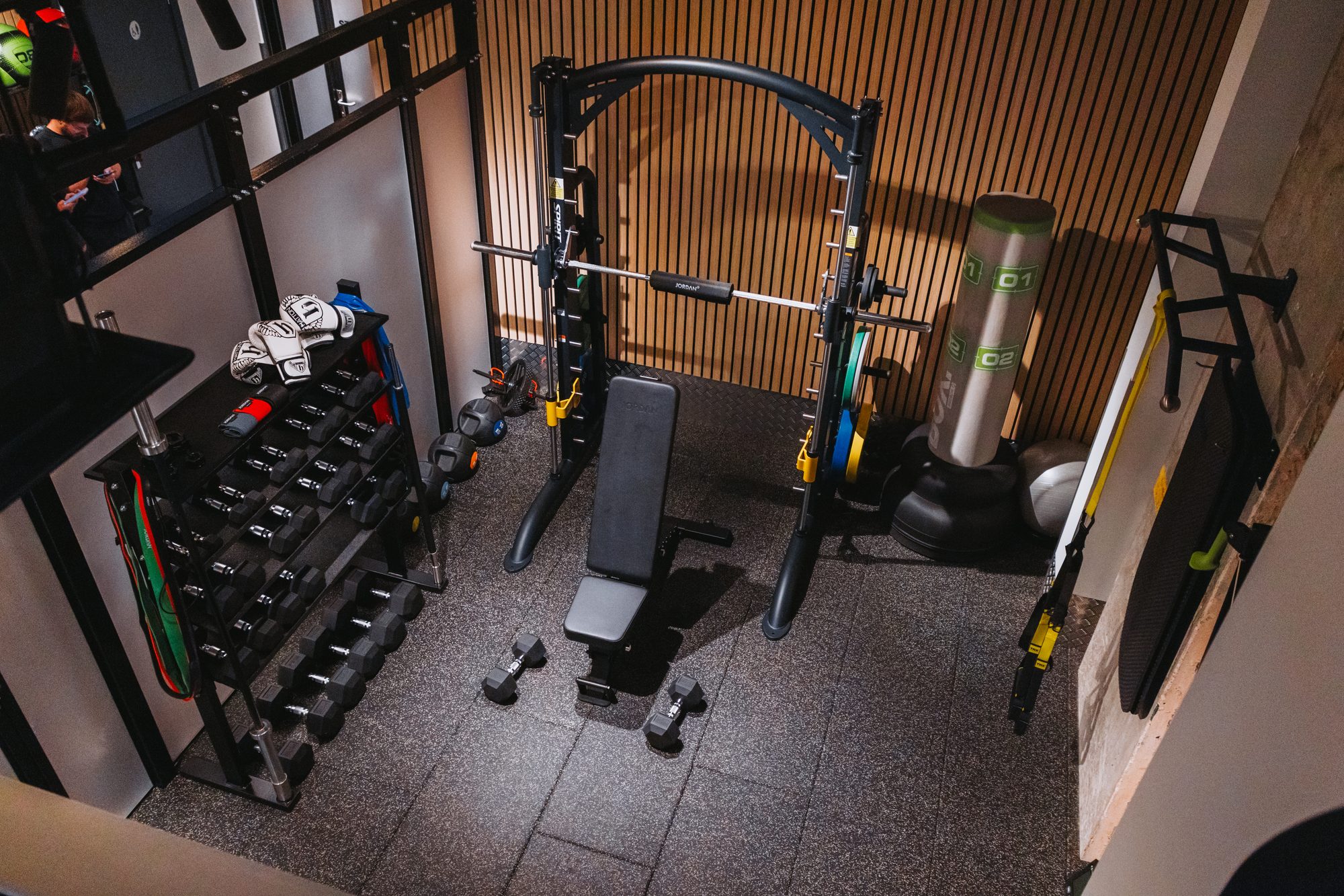 Power POD at GYMPODS with Smith machine, dumbbell rack, bench and punch bag